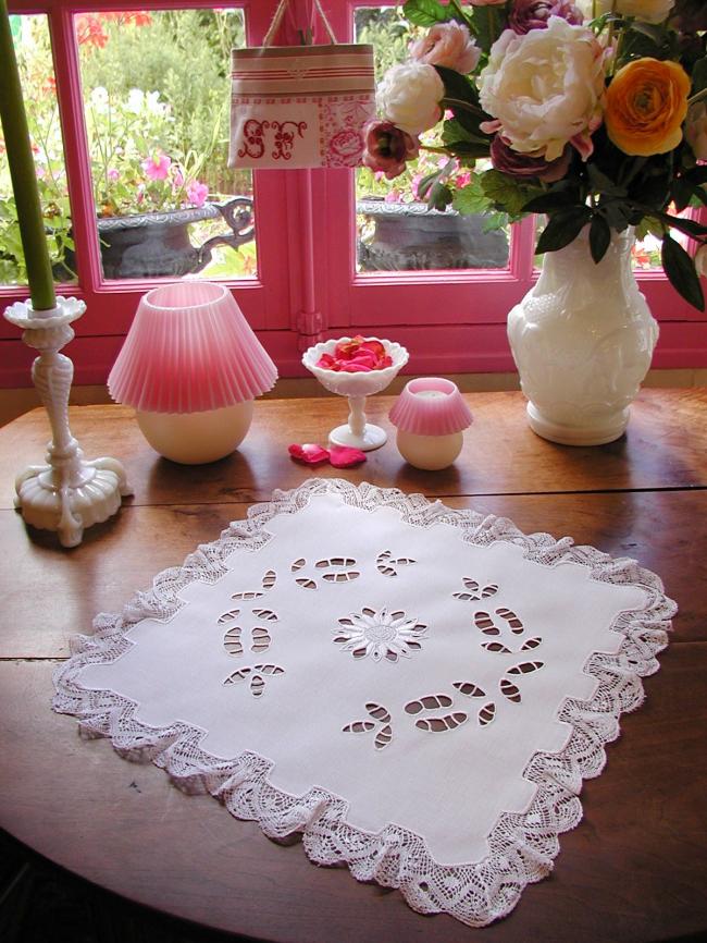 Striking table centre with handmade Richelieu works and bobbin lace edging