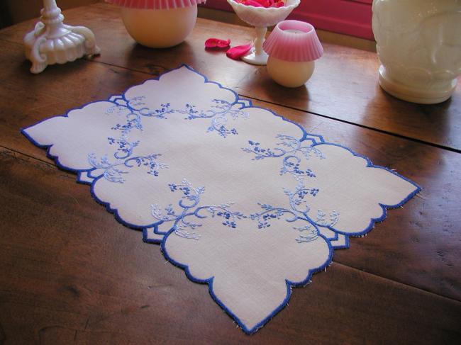 Lovely table centre with hand-embroidered blue tiny flowers