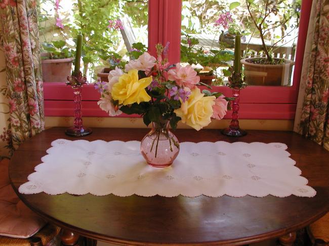 Breathtaking table runner with embroidered garland of flowers