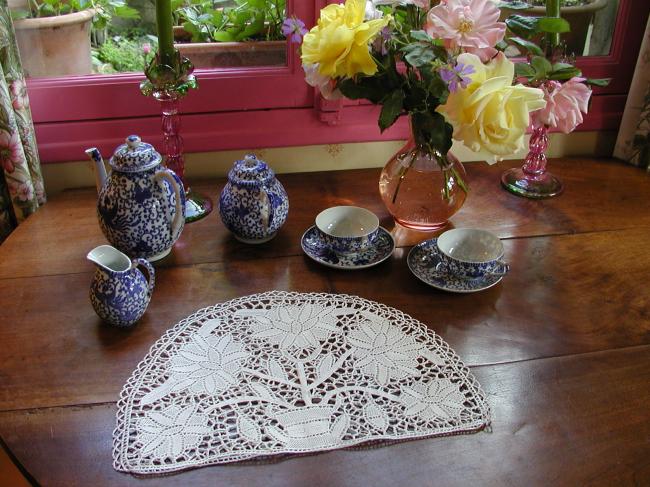 Gorgeous tea cosy made of Venezia  needle lace despicting basket of flowers
