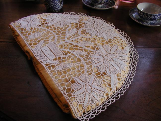 Gorgeous tea cosy made of Venezia  needle lace despicting basket of flowers