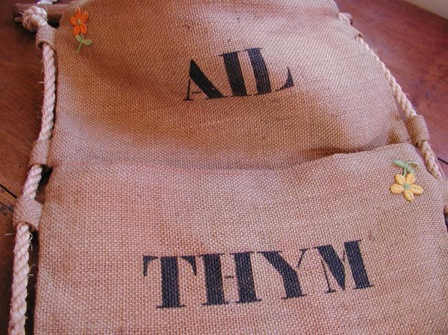 Very original  kitchen stand in jute to store bay leaves, thyme and garlic