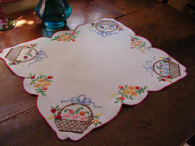 Gorgeous table centre with lovely embroidered baskets of flowers