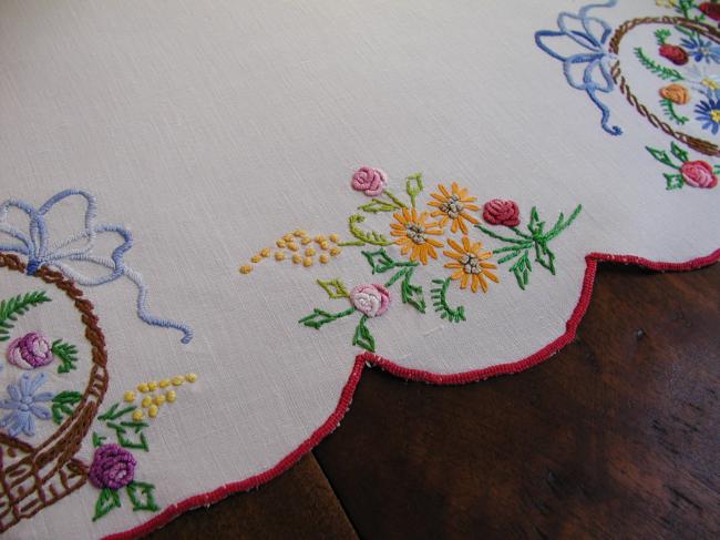 Gorgeous table centre with lovely embroidered baskets of flowers