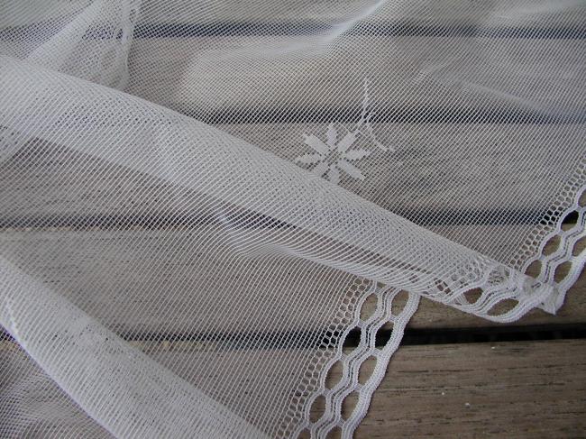 Lovely pair of net curtain, with floral pattern, ready to be hanged