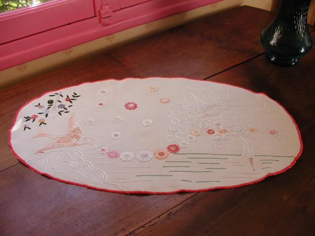 Lovely oval table centre depicting gulls transporting a garland of flowers