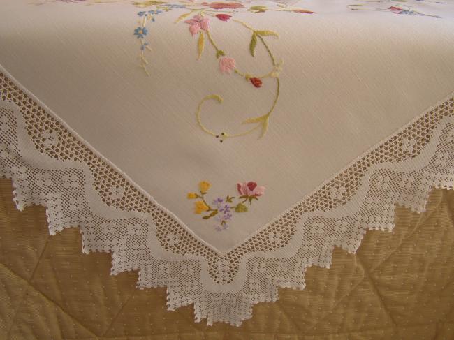 Really breathtaking tablecloth with hand-embroidered flowers and lace edging
