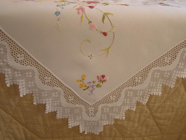 Really breathtaking tablecloth with hand-embroidered flowers and lace edging