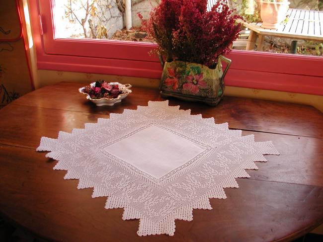 Gorgeous table centre with crochet lace depicting crowns of lauriel
