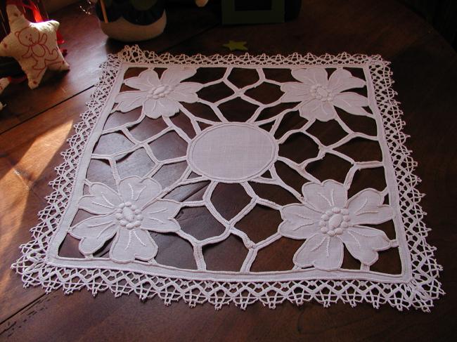 Striking Richelieu handmade embroidered table centre with bobbin lace