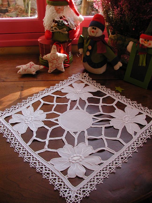 Striking Richelieu handmade embroidered table centre with bobbin lace