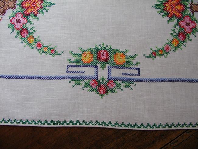 Lovely cross stitches table centre with vibrant colors