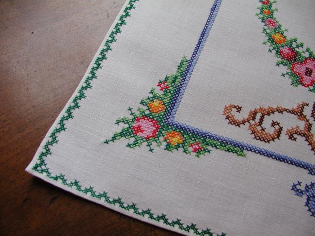 Lovely cross stitches table centre with vibrant colors