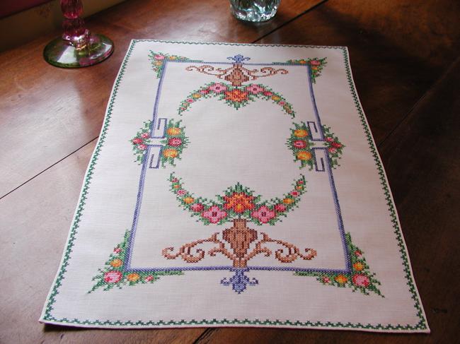 Lovely cross stitches table centre with vibrant colors