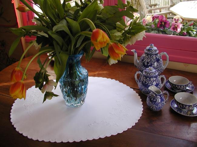 Marvellous oval table centre in irish Mountmellick white embroidery