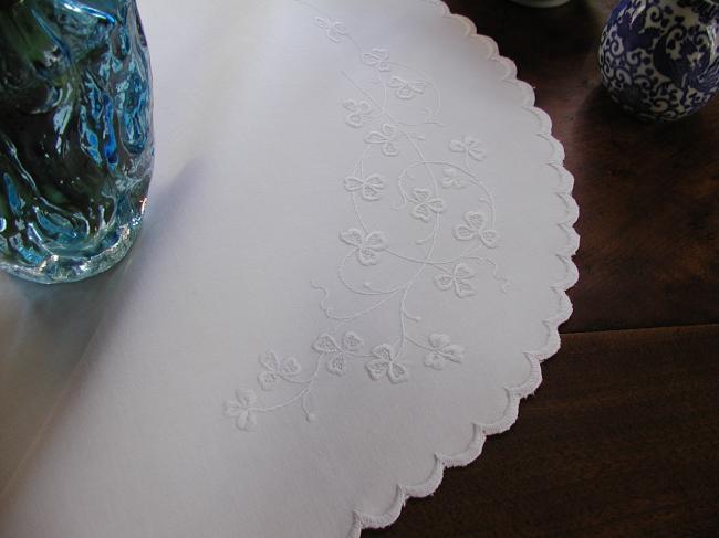 Marvellous oval table centre in irish Mountmellick white embroidery