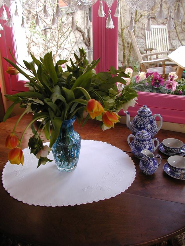 Marvellous oval table centre in irish Mountmellick white embroidery