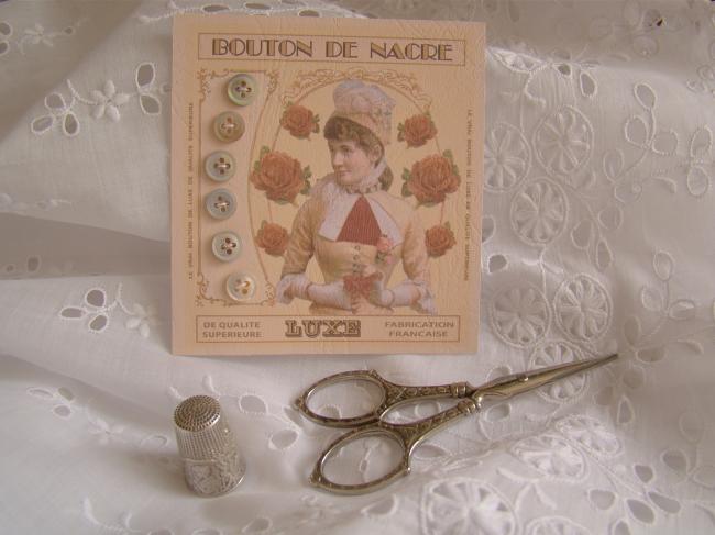 Lovely card with 6 little antique buttons in grey light mother of pearl