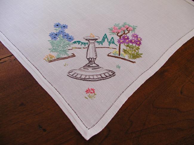 So charming table centre with hand-embroidered crinoline in english garden