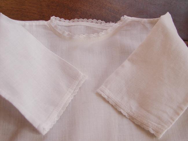 Charming little baby vest in cotton veil with tiny lace