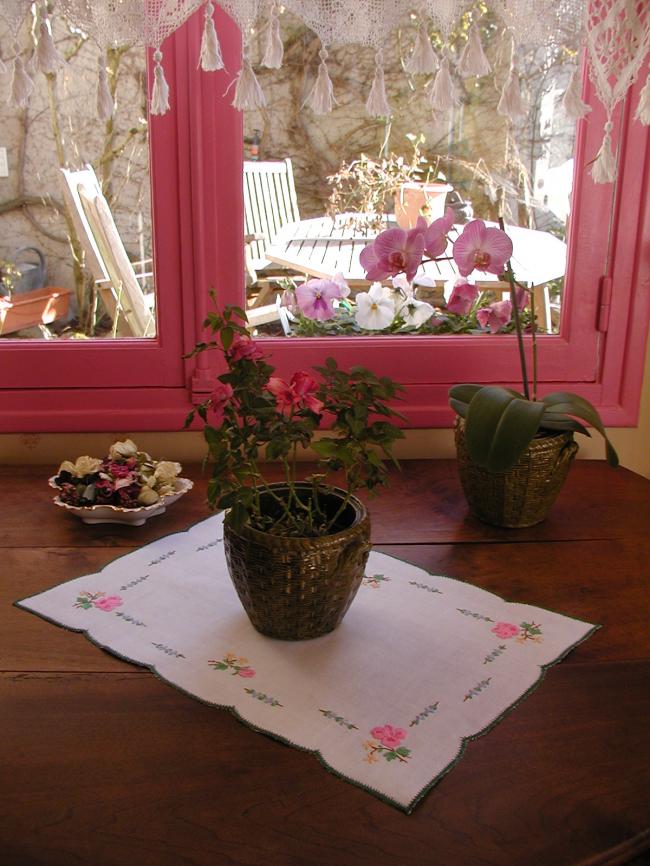 Very romantic table centre with hand-embroidered flowers, acidulous colors