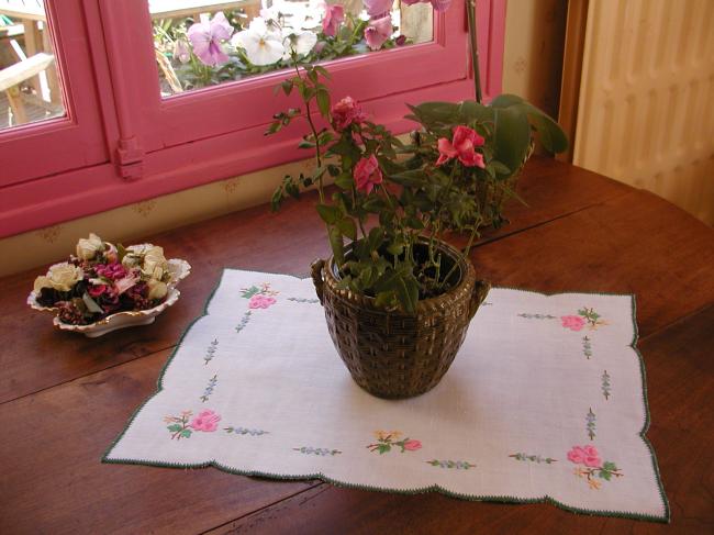 Very romantic table centre with hand-embroidered flowers, acidulous colors