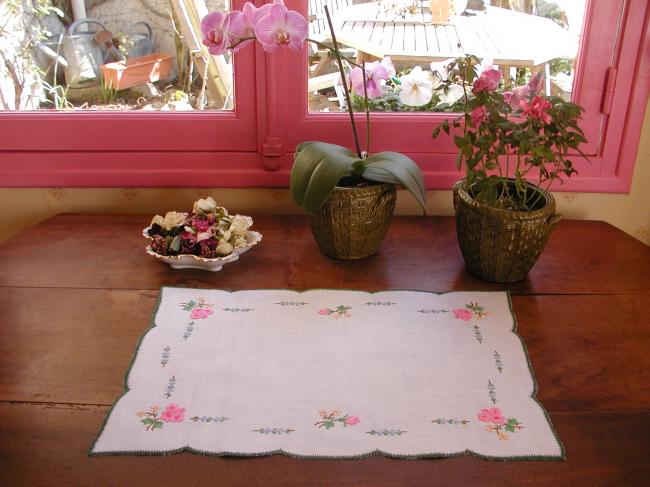 Very romantic table centre with hand-embroidered flowers, acidulous colors