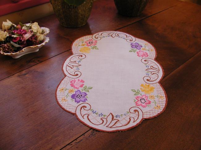 Really pretty table centre with rich embroidered floral border