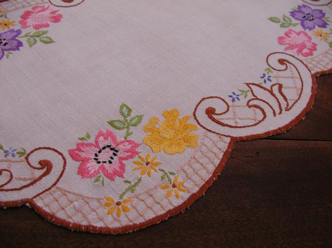 Really pretty table centre with rich embroidered floral border