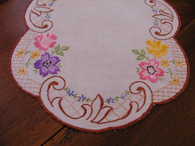 Really pretty table centre with rich embroidered floral border