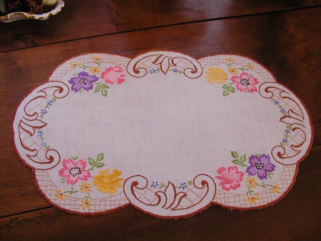 Really pretty table centre with rich embroidered floral border