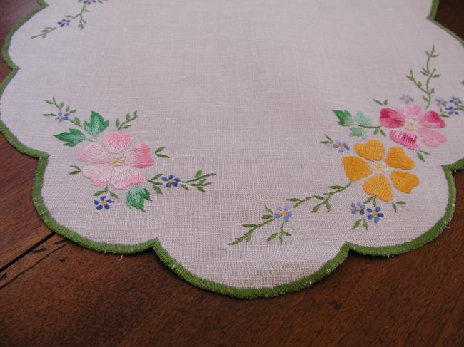 Romantic set with a table centre with hand-embroidered flowers, acidulous colors