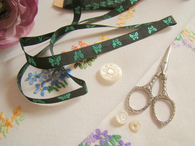 Lovely old little ribbon in black with vowen butterflies in green, width 10mm