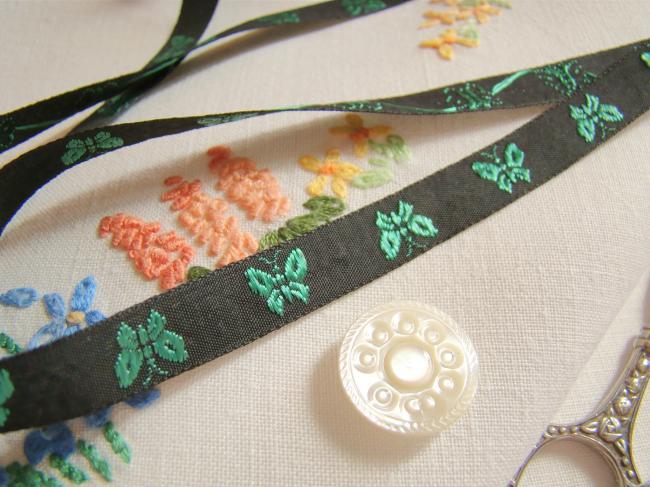 Lovely old little ribbon in black with vowen butterflies in green, width 10mm