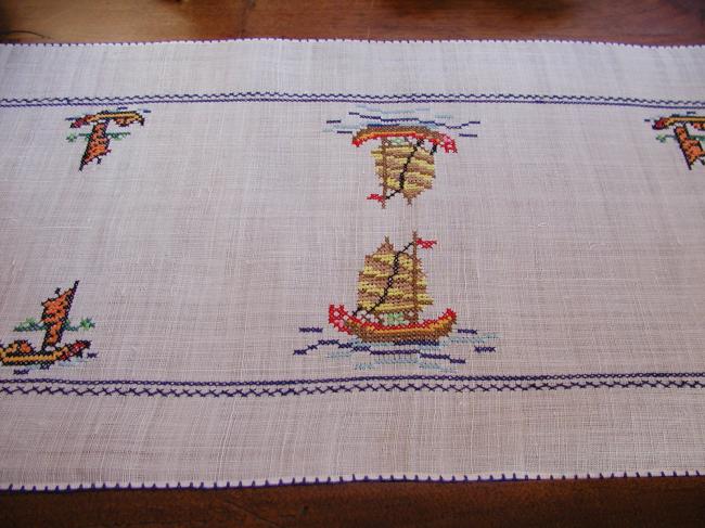 Lovely pinã table runner with hand-embroidered indochineese boats