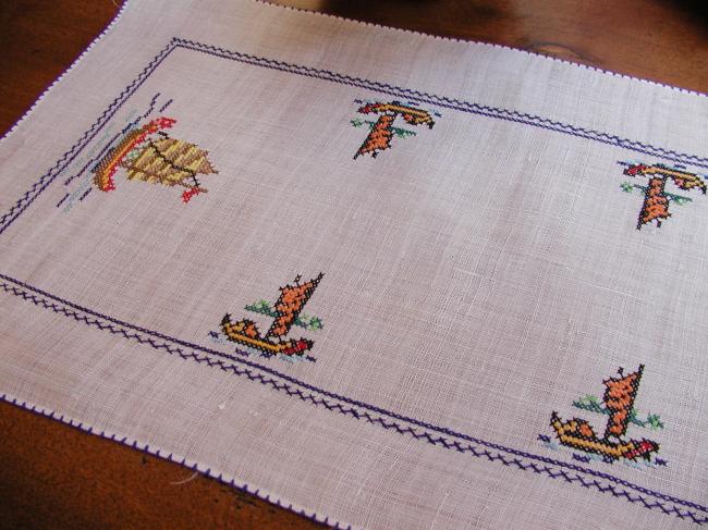 Lovely pinã table runner with hand-embroidered indochineese boats