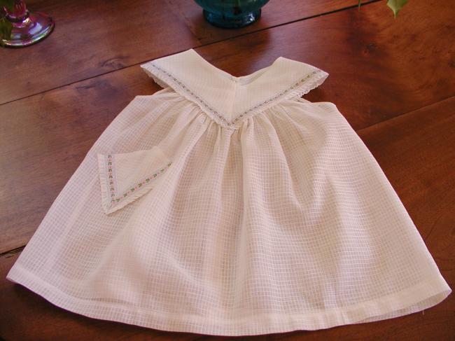 Charming baby summer dress with flowered braids
