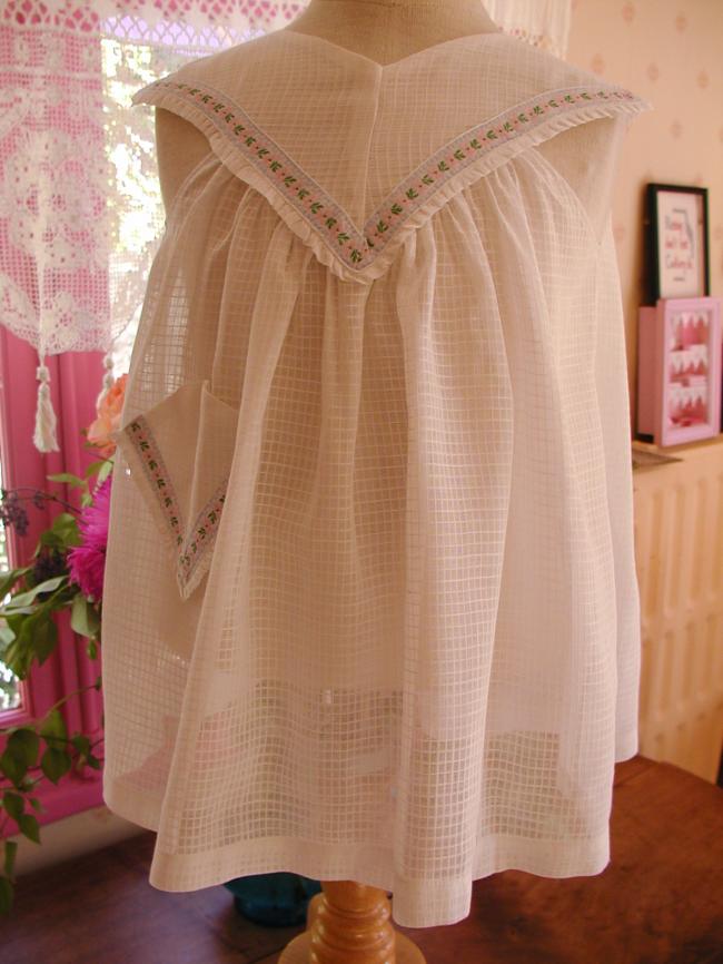 Charming baby summer dress with flowered braids