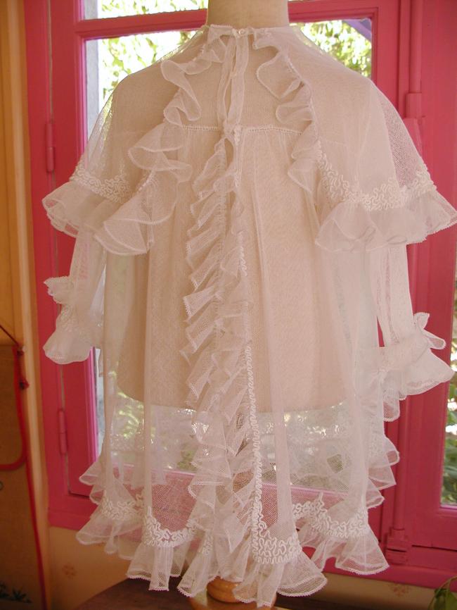 Gorgeous baby coat in net with hand-embroidery and flounces 1900