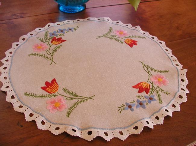 Gorgeous round table centre with hand-embroidered flowers and bobbin lace