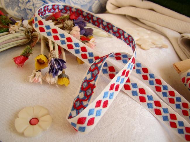 Adorable old little ribbon with vowen in blue, white and red, width 10mm