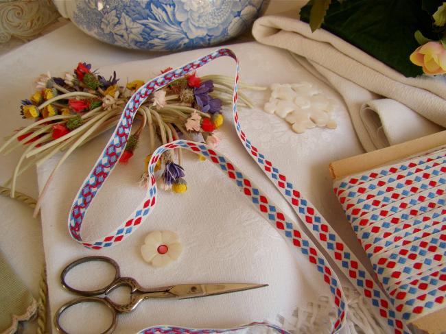 Adorable old little ribbon with vowen in blue, white and red, width 10mm