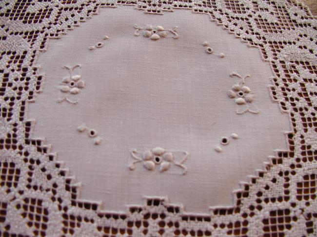 Gorgeous set of eight linen doilies with hand worked filet lace.