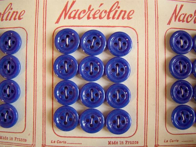 Jolie carte de 12 boutons ronds en opaline bleu nuit ' Nacréoline' 1940