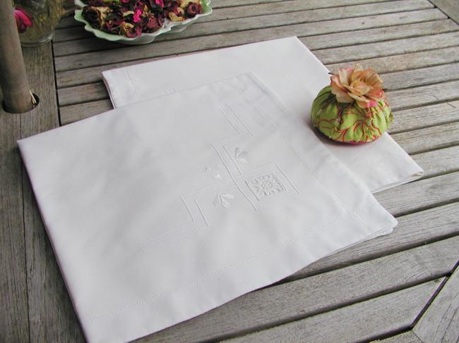 A lovely pair of pillow cases in cotton with  lace inserts and embroidery
