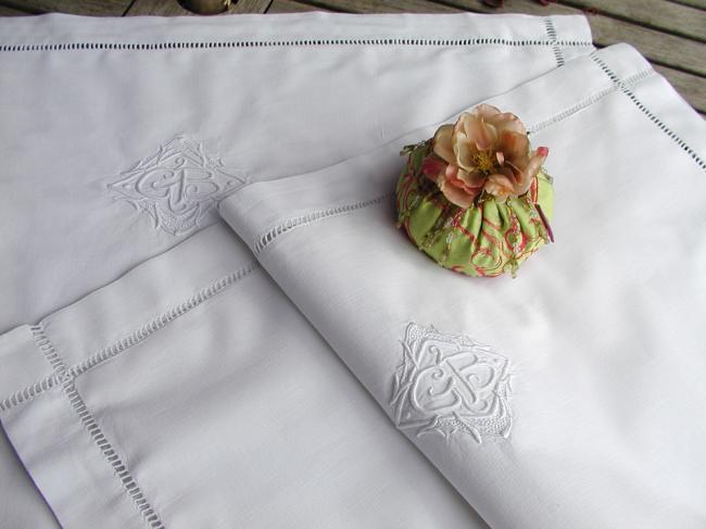 A lovely pair of pillow cases in linen with hand-embroidered monogram GB