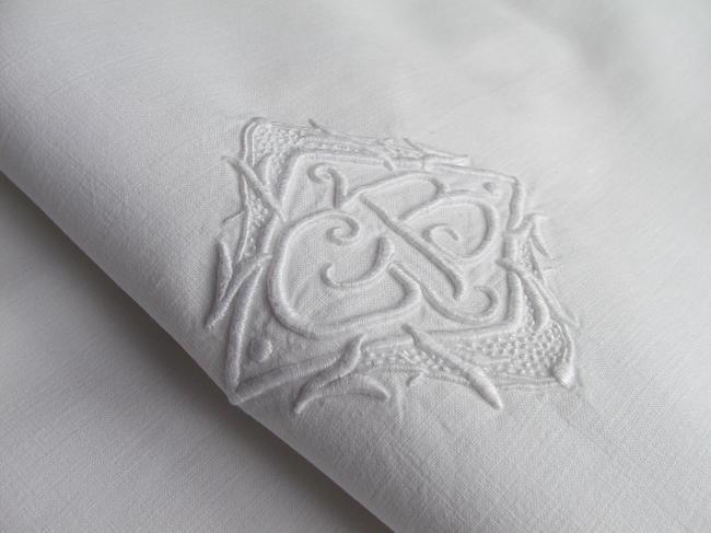 A lovely pair of pillow cases in linen with hand-embroidered monogram GB