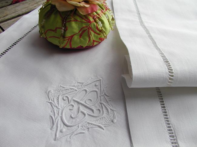 A lovely pair of pillow cases in linen with hand-embroidered monogram GB