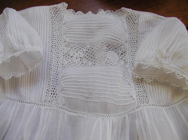 Gorgeous baby dress with Irish point lace and religious folds, 1890