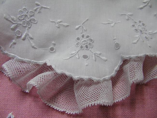 Adorable double baby bib with hand embroidered flowers and net lace